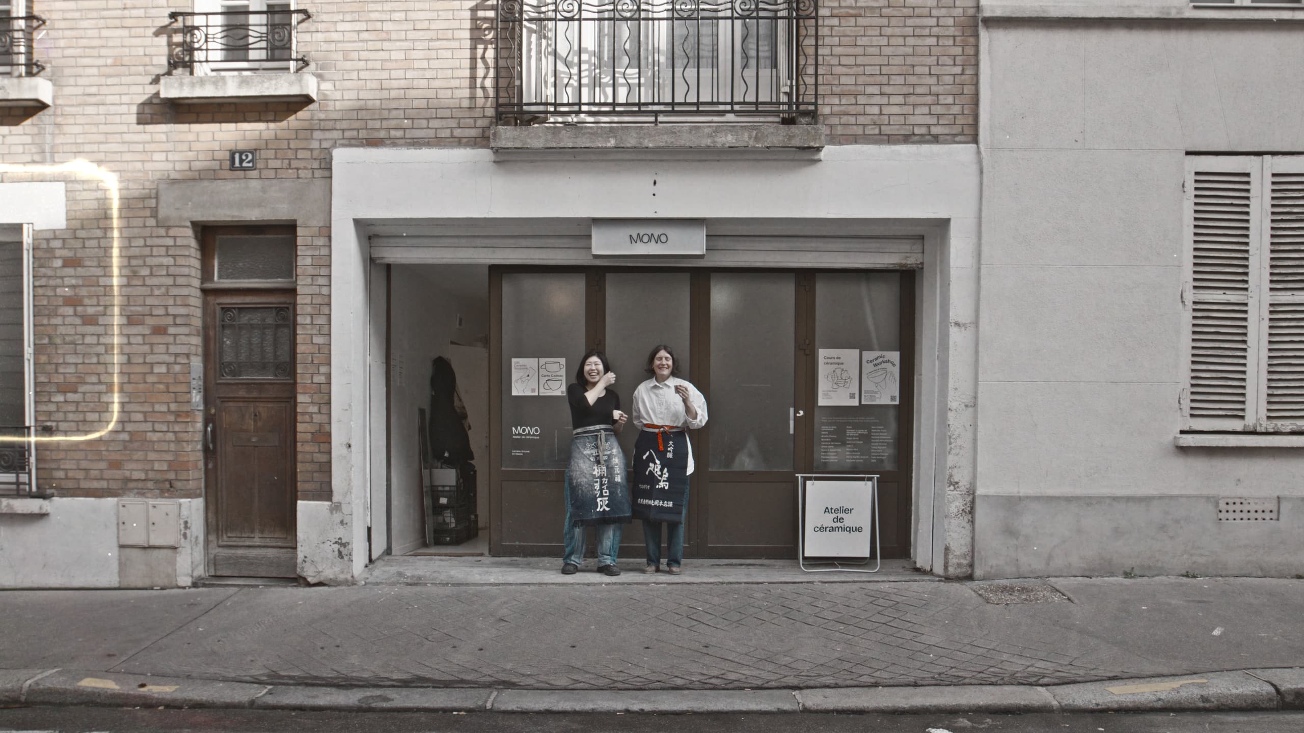 The two artisans outside the Mono shopfront in Paris