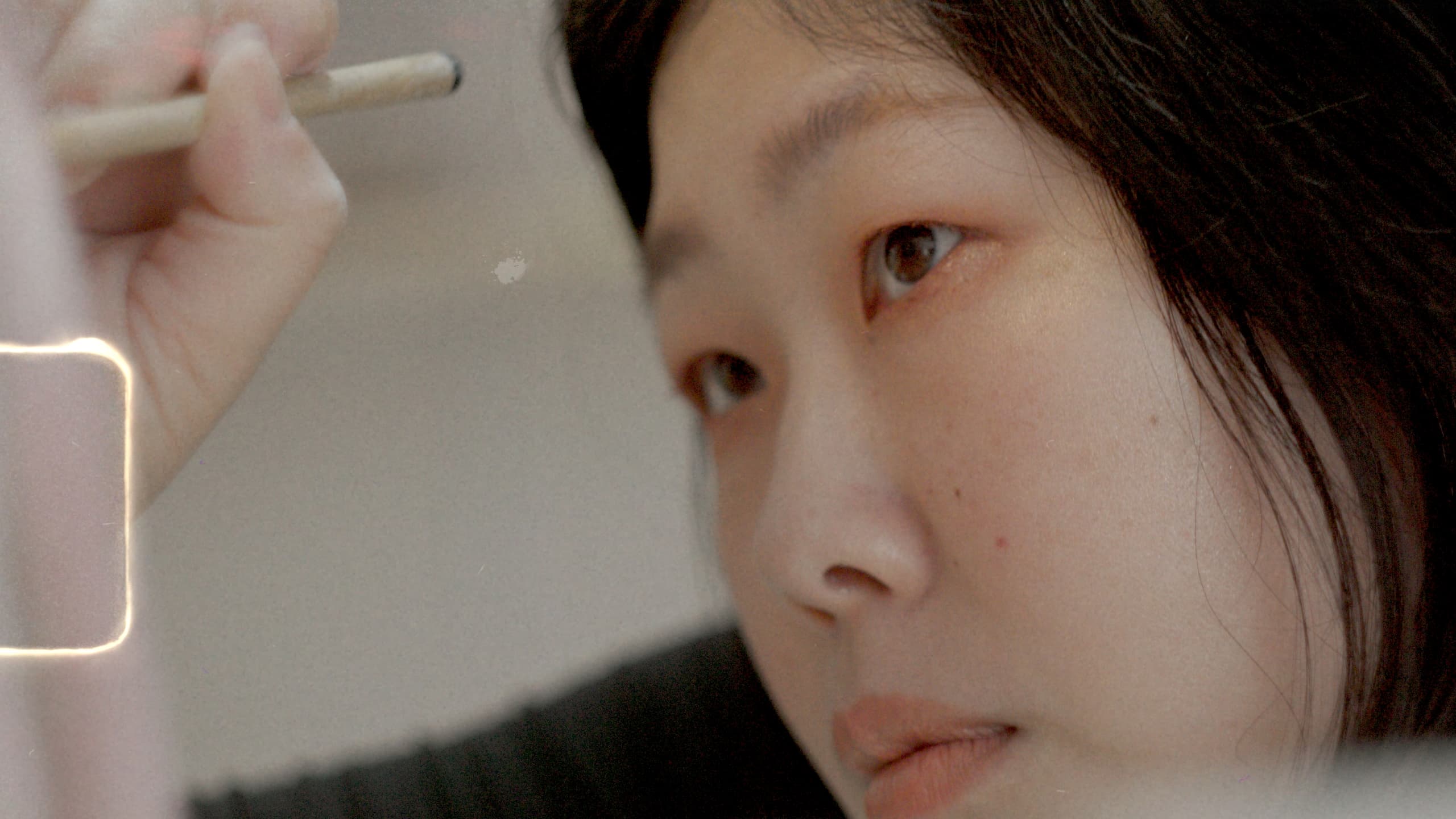 An artisan in close-up, intent on her work