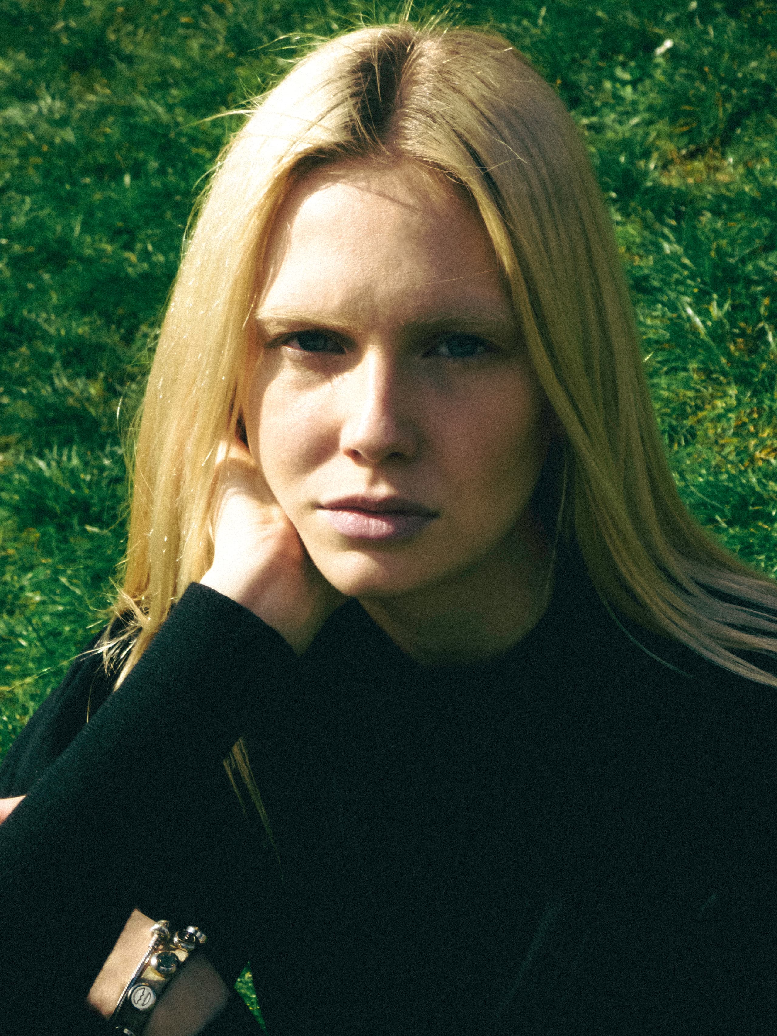 Lea Pliger in close-up, chin resting on her hand